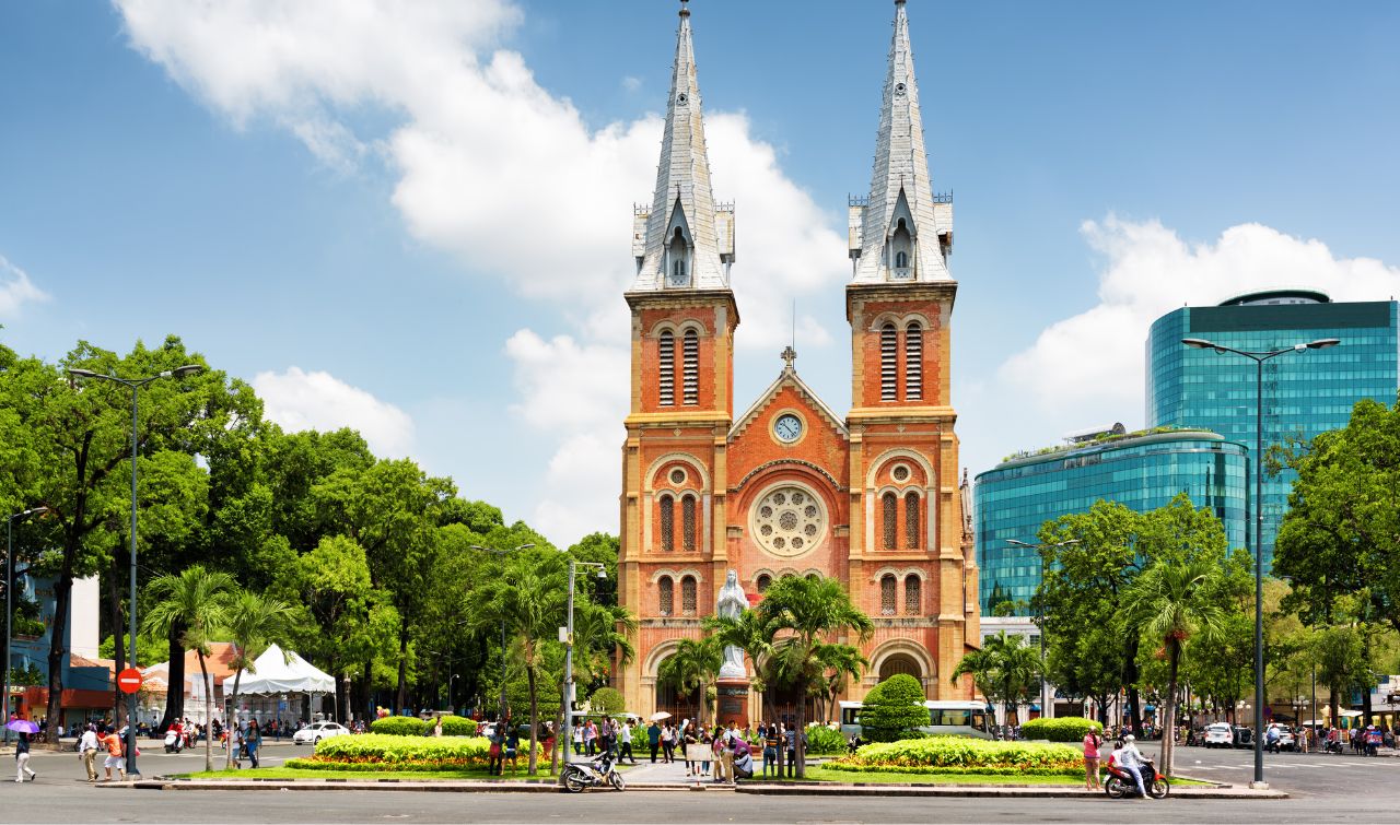 Saigon Notre-Dame Cathedral with twin spires and red-brick facade in Ho Chi Minh City